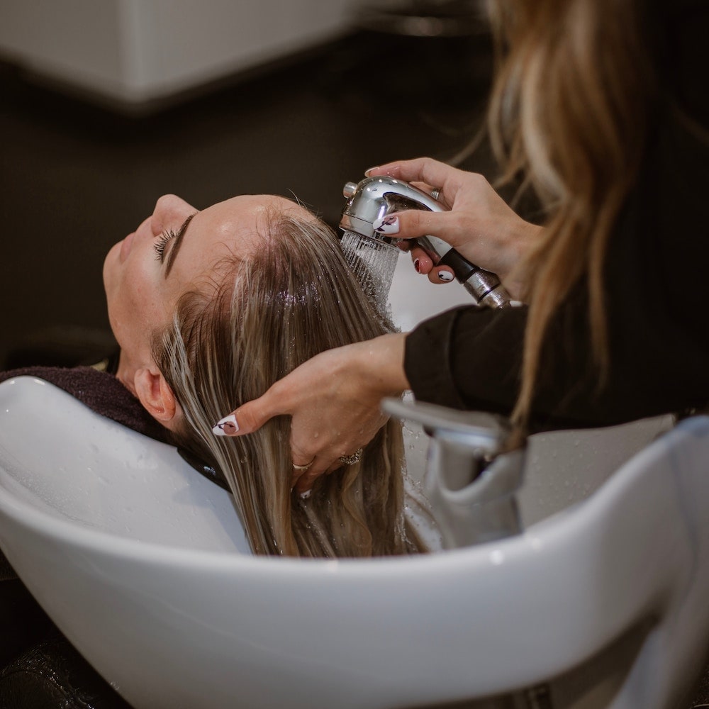 client having their hair washed